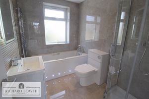 Stylish Bath/Shower/WC- click for photo gallery